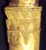 Трикутники із зерен