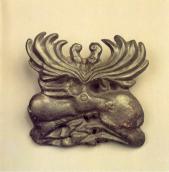 Пластина вуздечки у формі лежачого оленя