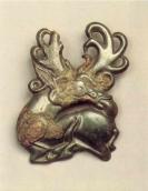 Пластина вуздечки у формі лежачого лося