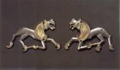 Бляшки у формі звірів (коней ?)