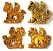 Бляшки у формі грифонів