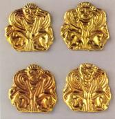 Бляшки у формі сфінксів