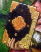 Ліва рука з книгою