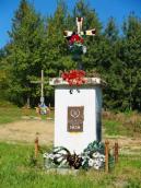 Пам’ятний знак на місці поховань…