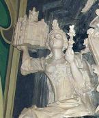 Ліва постать жінки з моделлю церкви