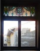 Фрагмент віка з вітражем