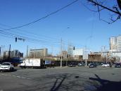 Порожнє місце між будинками № 56 та 54