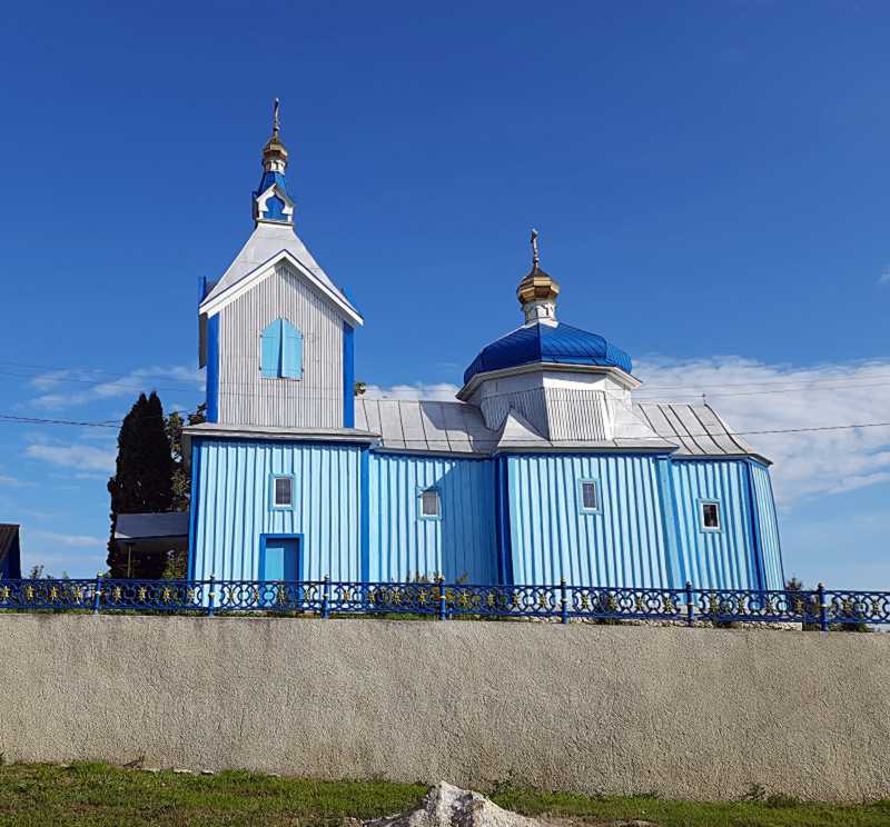 Фото Петра Грушка 10 серпня 2023 р. з сайту uk.wikipedia.org Дерев’яна церква… Церква Воздвиження