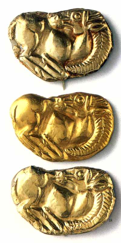 Бляшки у формі коней