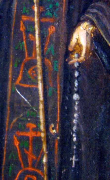 Ліва рука з чотками